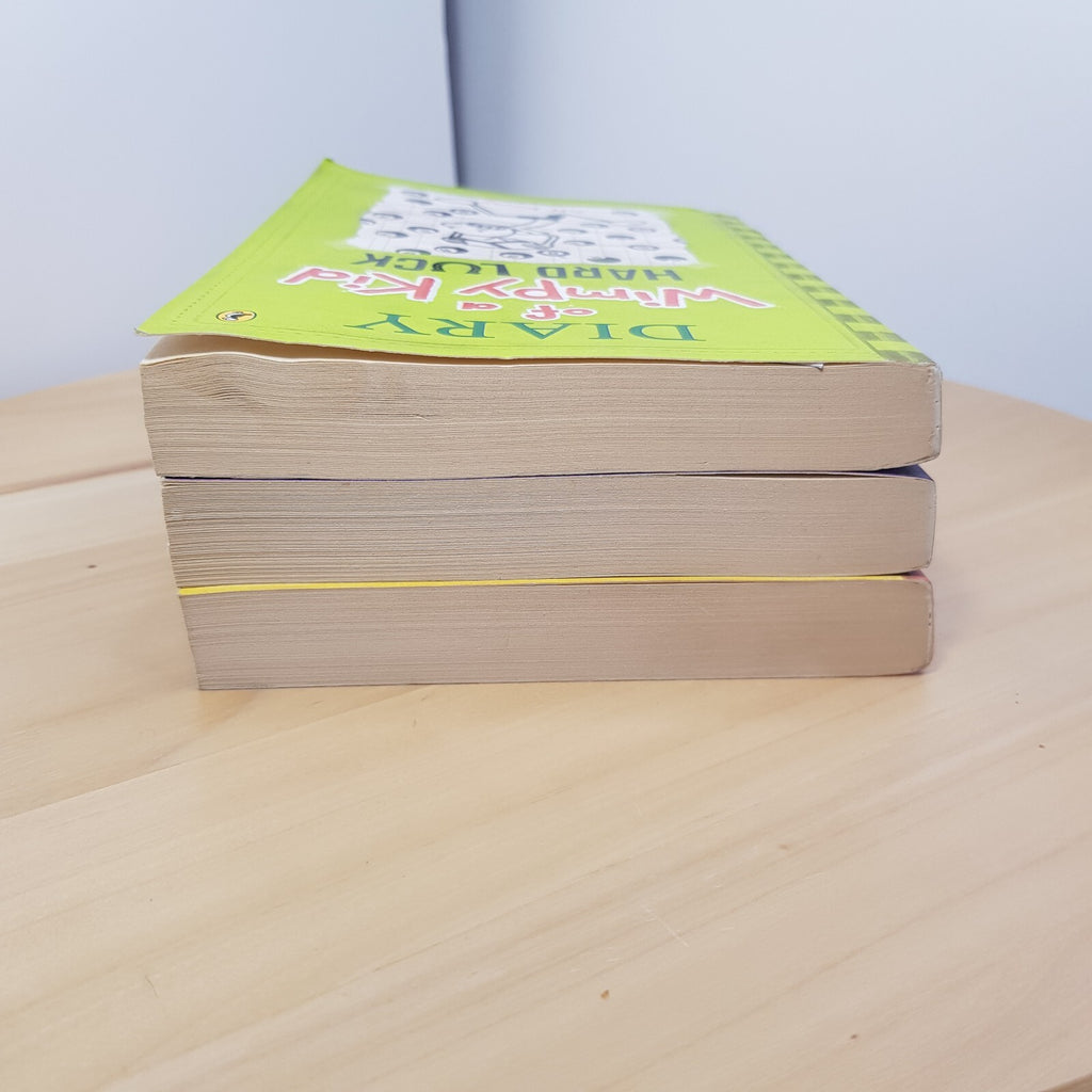 Diary of wimpy kid #4 #5 #8 (3 books) by Jeff Kinney - paperbacks