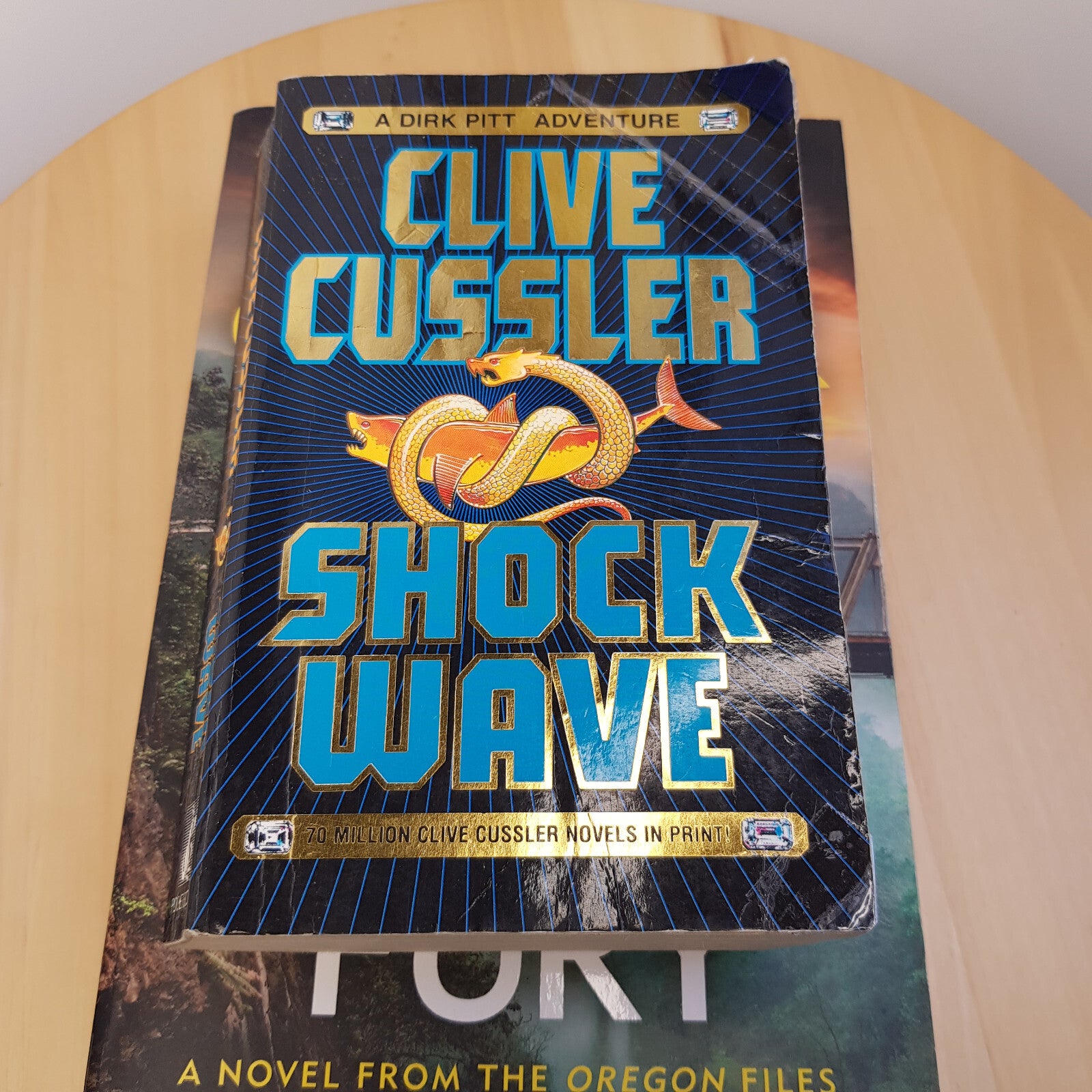 Clive Cussler - Typhoon Fury (large paperback) & Shock Wave (small paperback)