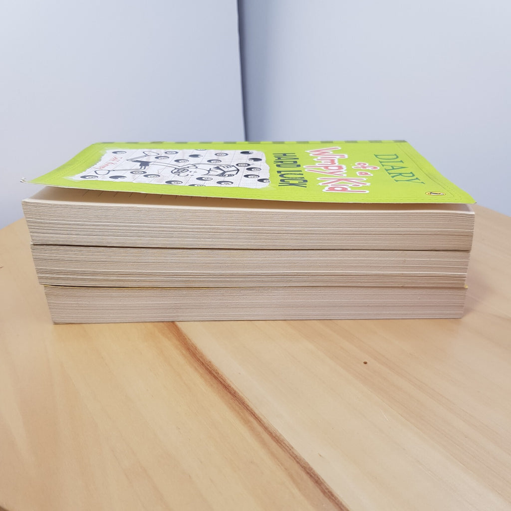 Diary of wimpy kid #4 #5 #8 (3 books) by Jeff Kinney - paperbacks