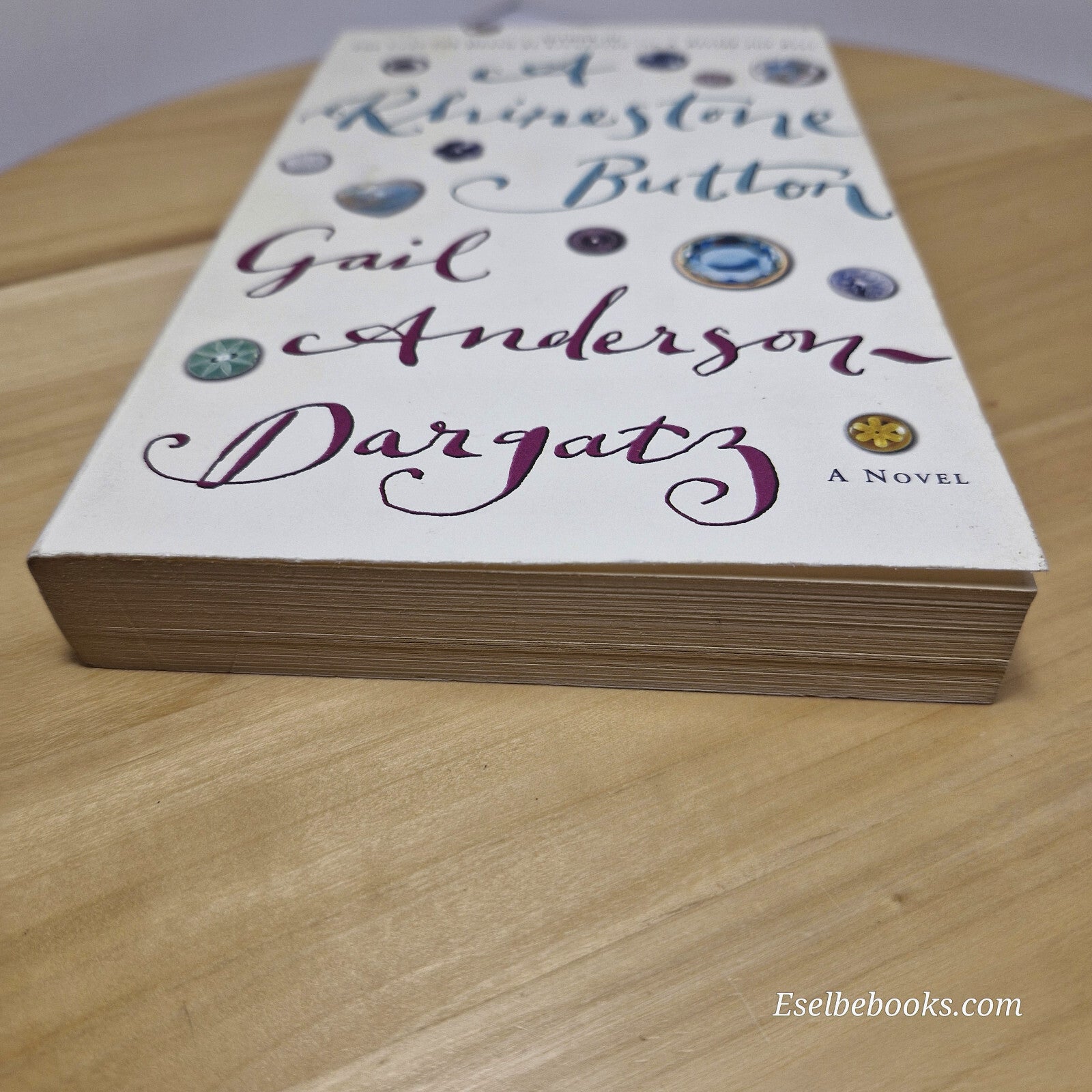 Fiction: A rhinestone button by Gail Anderson-Dargatz - paperback