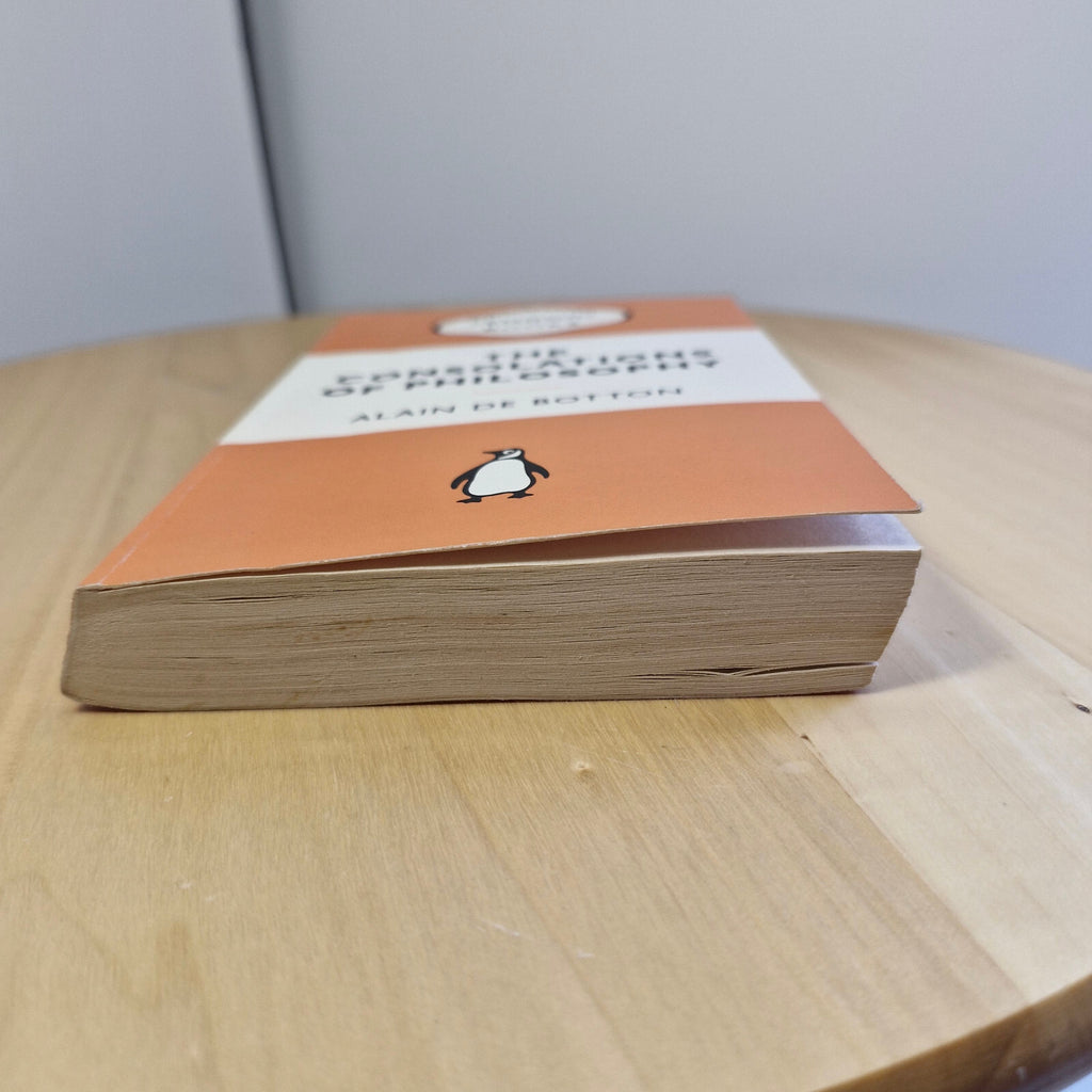 The consolations of philosophy by Alain De Botton - Penguin Books orange cover