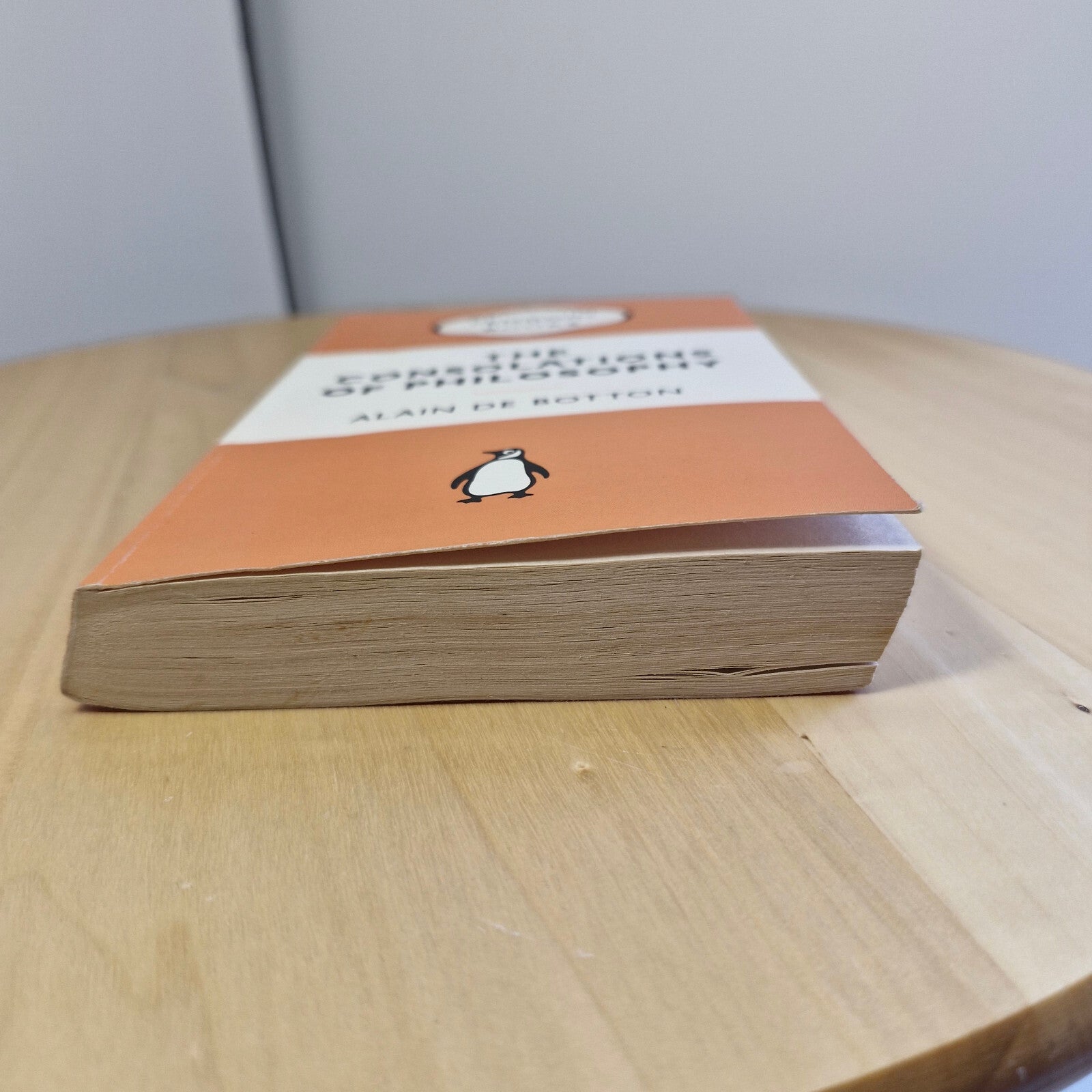 The consolations of philosophy by Alain De Botton - Penguin Books orange cover