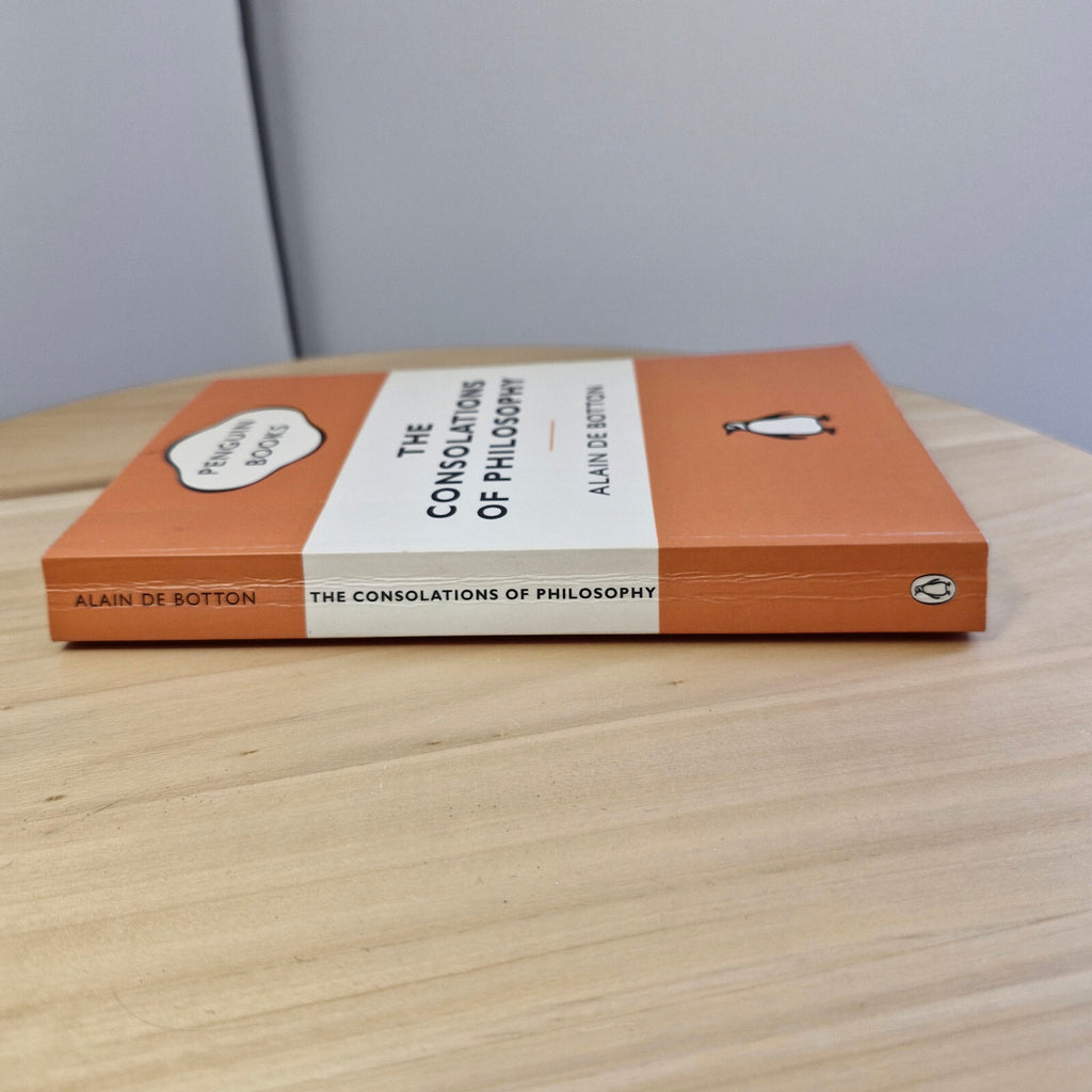 The consolations of philosophy by Alain De Botton - Penguin Books orange cover