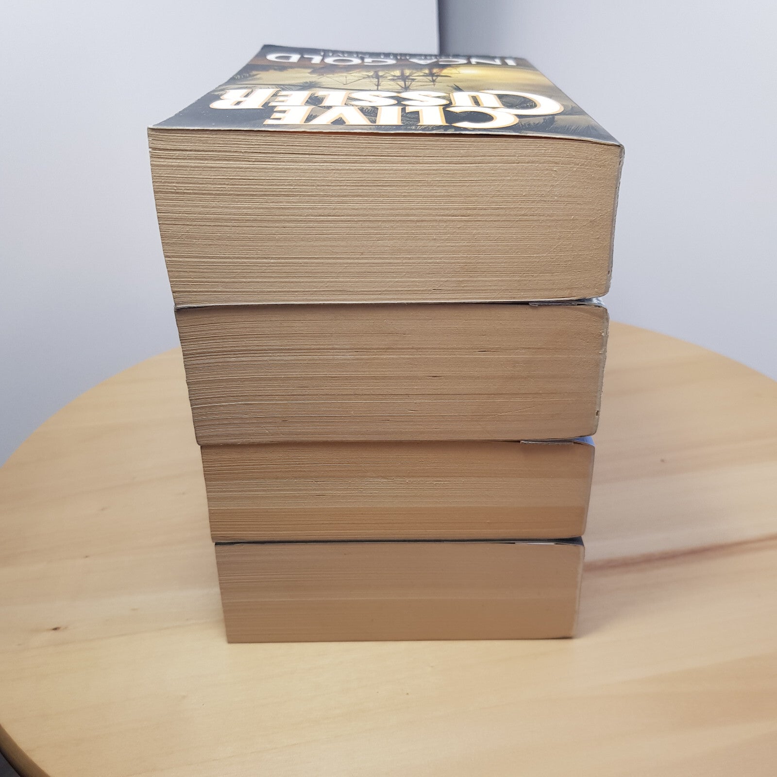 4 x Clive Cussler book bundle - Inca Gold/Treasure of Khan/The Navigator/Plag...