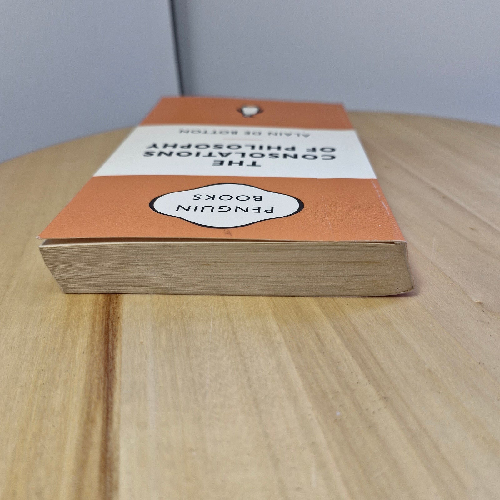 The consolations of philosophy by Alain De Botton - Penguin Books orange cover